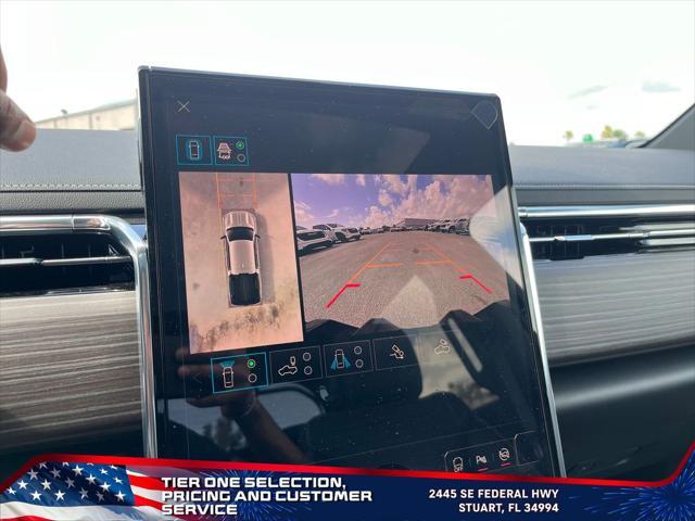Photo of 2025 Summit White GMC Sierra EV