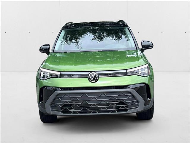 Photo of 2025 Bright Moss Green Metallic/Deep Black Roof Volkswagen Taos