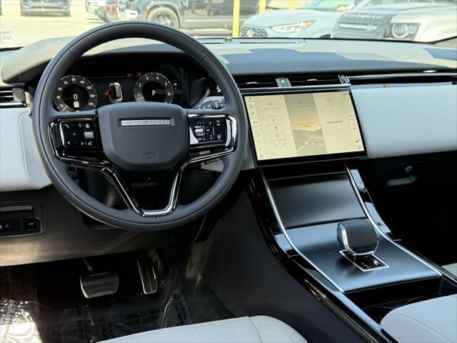 Photo of 2026 SANTORINI BLACK Land Rover Range Rover Velar