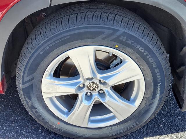Photo of 2023 Ruby Flare Pearl Toyota Highlander Hybrid