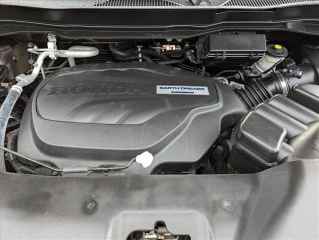 Photo of 2020 Black Copper Pearl Honda Passport