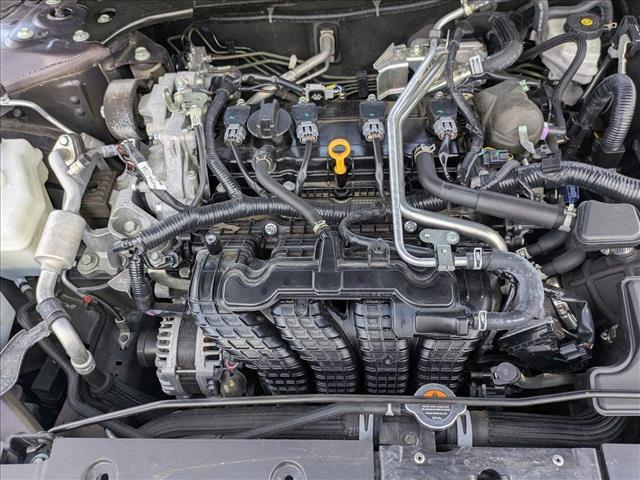 Photo of 2024 Garnet Pearl Metallic Nissan Altima