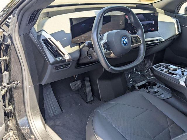 Photo of 2025 Black Sapphire Metallic BMW iX