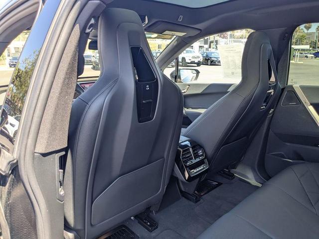 Photo of 2025 Black Sapphire Metallic BMW iX