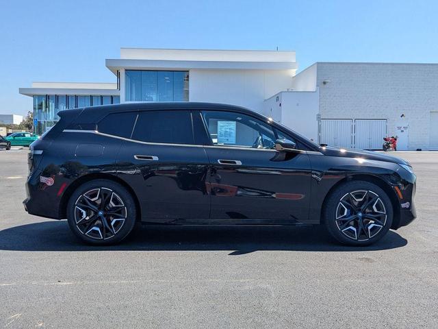 Photo of 2025 Black Sapphire Metallic BMW iX
