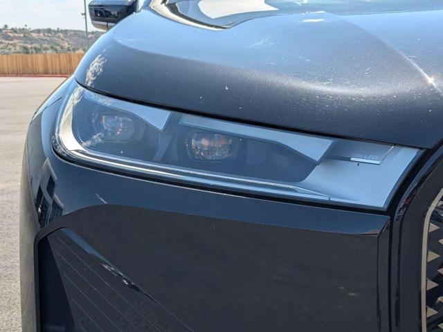 Photo of 2025 Black Sapphire Metallic BMW iX