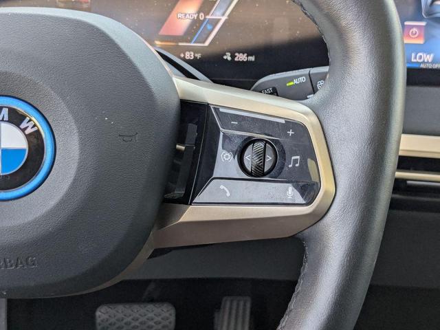 Photo of 2025 Black Sapphire Metallic BMW iX
