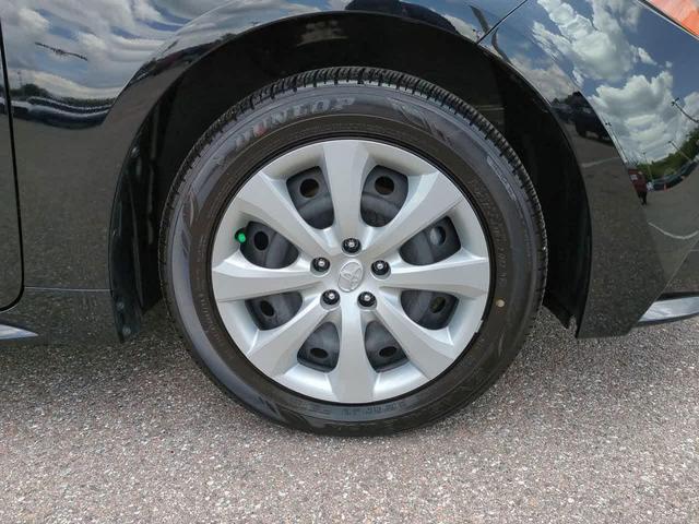 Photo of 2025 Midnight Black Metallic Toyota Corolla Hybrid