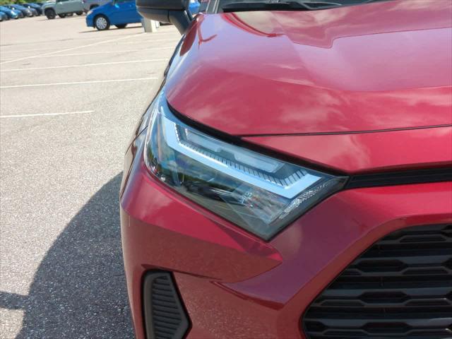 Photo of 2025 Ruby Flare Pearl Toyota RAV4 Hybrid
