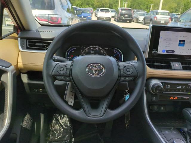 Photo of 2025 Ruby Flare Pearl Toyota RAV4 Hybrid