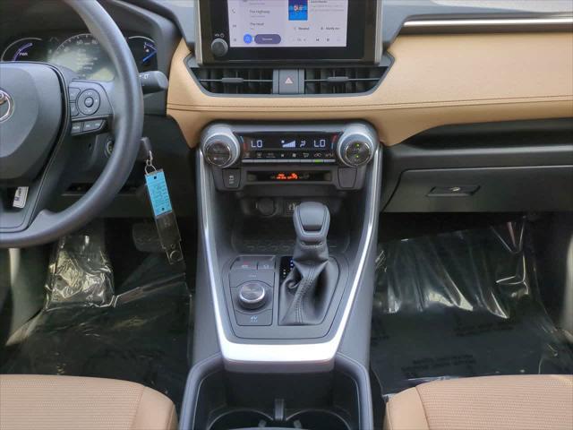 Photo of 2025 Ruby Flare Pearl Toyota RAV4 Hybrid