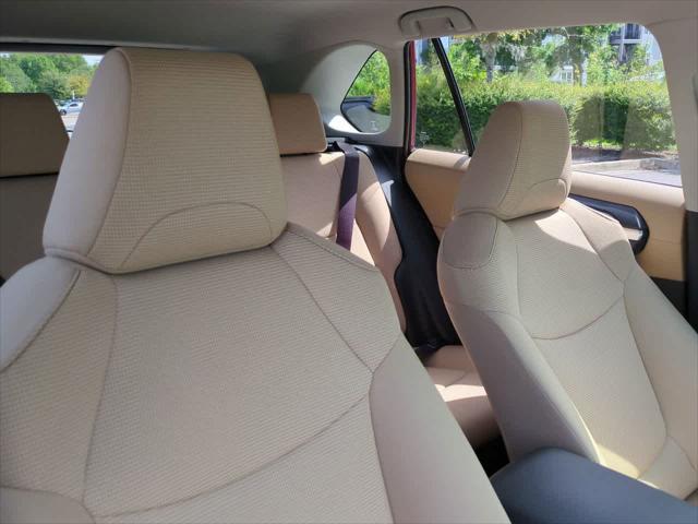 Photo of 2025 Ruby Flare Pearl Toyota RAV4 Hybrid