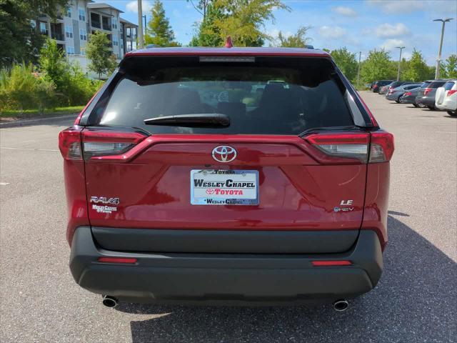 Photo of 2025 Ruby Flare Pearl Toyota RAV4 Hybrid