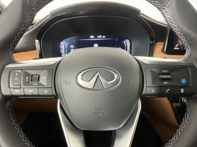 Photo of 2025 Majestic White/Black Obsidian INFINITI QX60