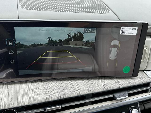 Photo of 2025 White Hyundai SANTA FE HEV