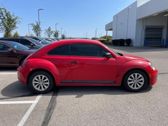 Photo of 2014 Tornado Red Volkswagen Beetle