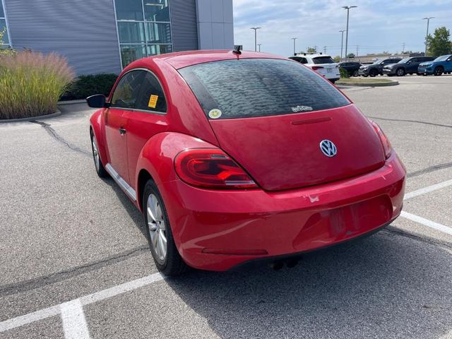 Photo of 2014 Tornado Red Volkswagen Beetle