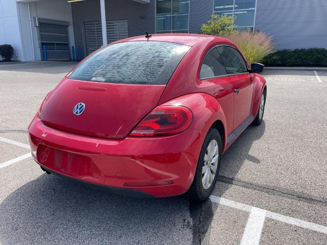 Photo of 2014 Tornado Red Volkswagen Beetle