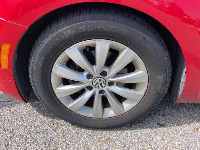 Photo of 2014 Tornado Red Volkswagen Beetle