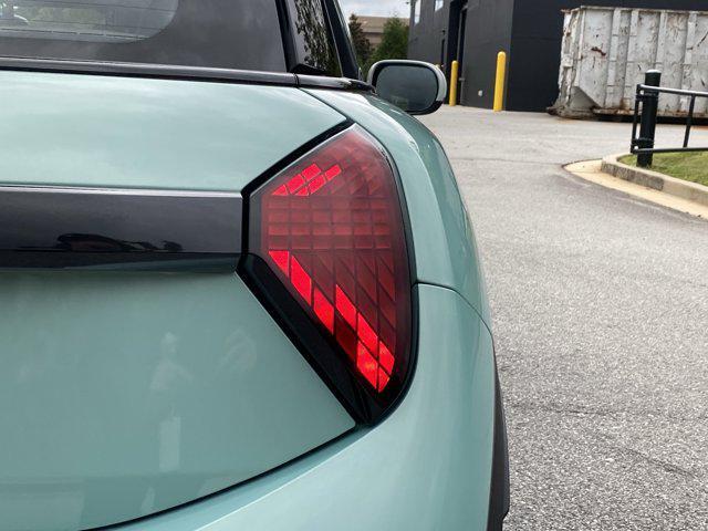 Photo of 2025 Ocean Wave Green Metallic MINI Hardtop