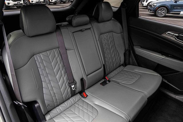 Photo of 2023 Jungle Green Kia Sportage