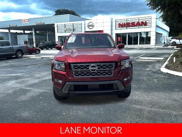 Photo of 2024 Cardinal Red Metallic Nissan Frontier