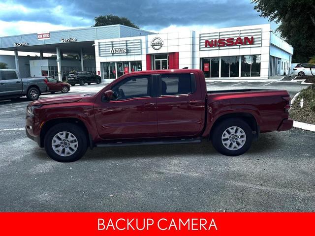 Photo of 2024 Cardinal Red Metallic Nissan Frontier