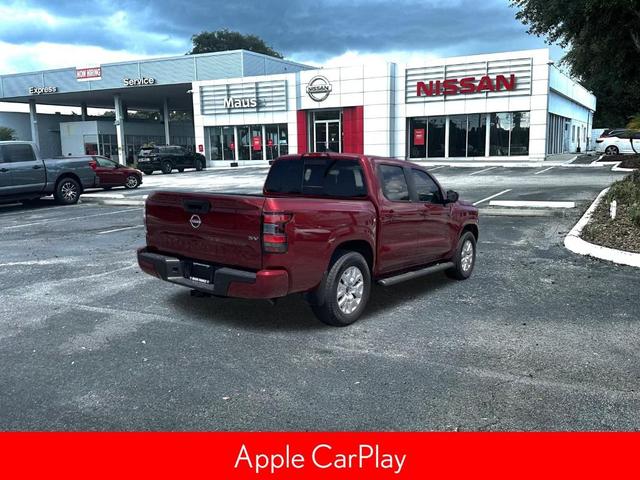 Photo of 2024 Cardinal Red Metallic Nissan Frontier