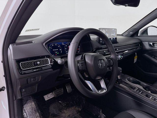 Photo of 2025 Platinum White Pearl Honda Civic Hybrid
