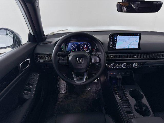 Photo of 2025 Platinum White Pearl Honda Civic Hybrid