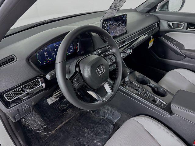 Photo of 2025 Platinum White Pearl Honda Civic Hybrid