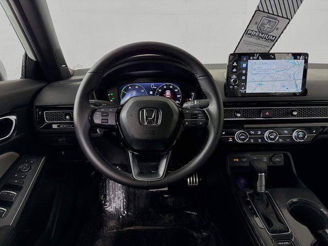 Photo of 2025 Platinum White Pearl Honda Civic Hybrid