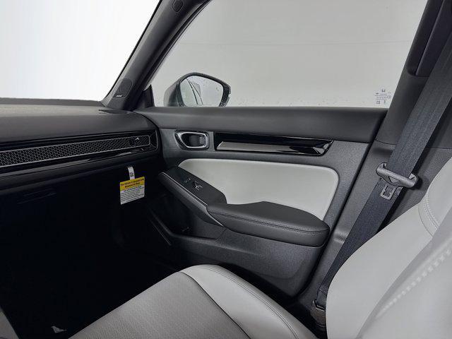 Photo of 2025 Platinum White Pearl Honda Civic Hybrid