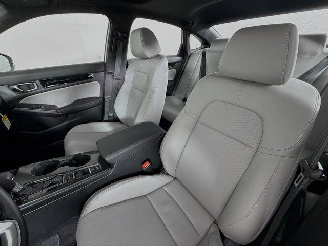 Photo of 2025 Platinum White Pearl Honda Civic Hybrid