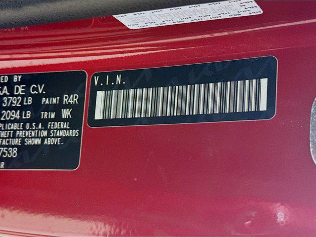 Photo of 2024 Currant Red Kia Forte
