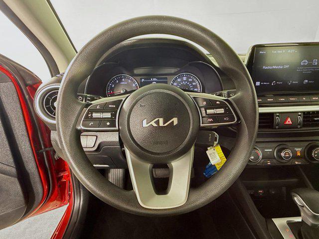 Photo of 2024 Currant Red Kia Forte