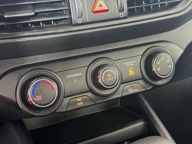 Photo of 2024 Currant Red Kia Forte