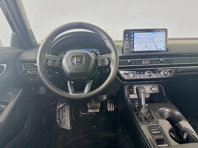 Photo of 2026 Crystal Black Pearl Honda Civic Hybrid