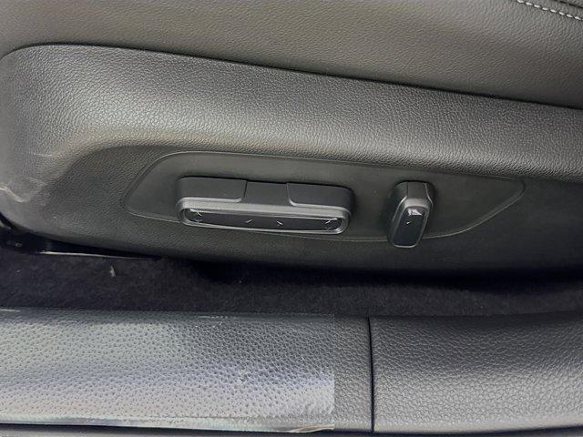 Photo of 2025 Boost Blue Pearl Honda Civic Hybrid