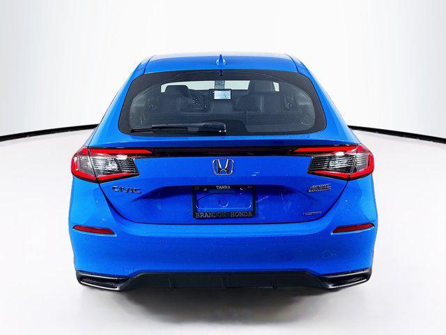 Photo of 2025 Boost Blue Pearl Honda Civic Hybrid