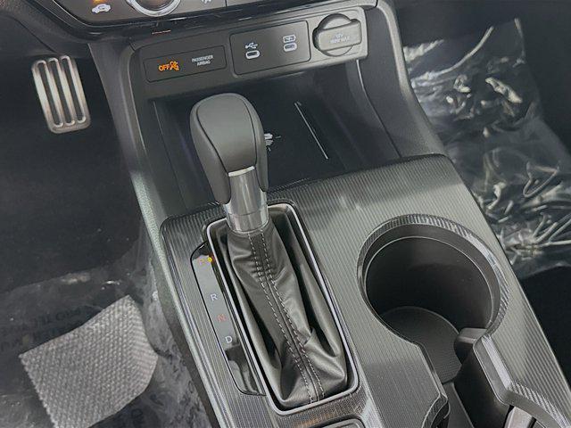 Photo of 2025 Boost Blue Pearl Honda Civic Hybrid