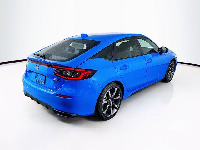Photo of 2025 Boost Blue Pearl Honda Civic Hybrid