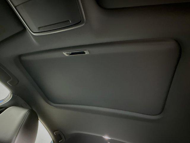 Photo of 2025 Boost Blue Pearl Honda Civic Hybrid
