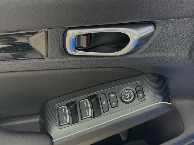 Photo of 2025 Boost Blue Pearl Honda Civic Hybrid