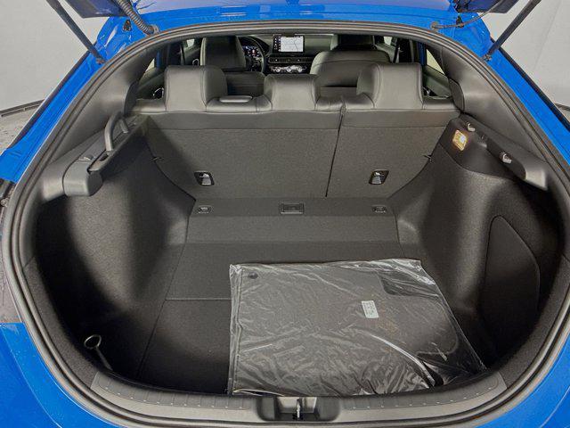 Photo of 2025 Boost Blue Pearl Honda Civic Hybrid