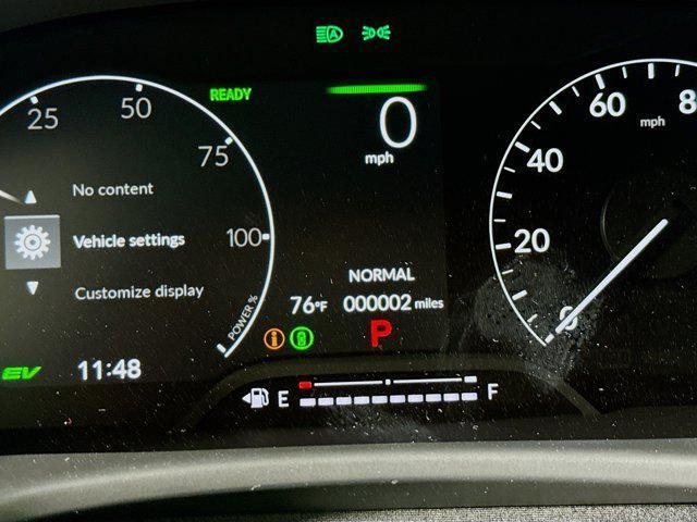 Photo of 2026 Platinum White Pearl Honda Civic Hybrid