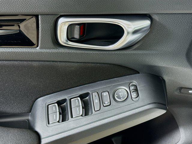 Photo of 2026 Platinum White Pearl Honda Civic Hybrid