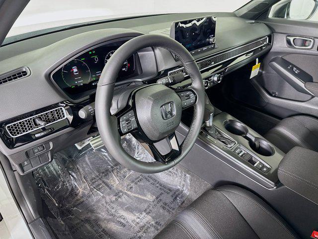 Photo of 2026 Platinum White Pearl Honda Civic Hybrid