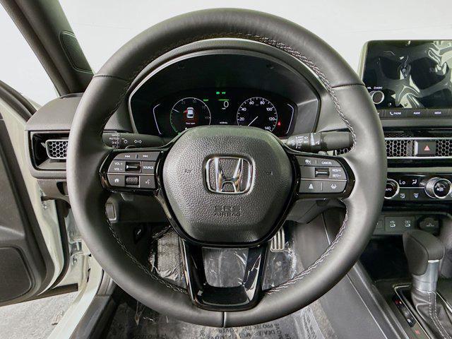 Photo of 2026 Platinum White Pearl Honda Civic Hybrid
