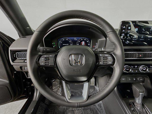Photo of 2026 Crystal Black Pearl Honda Civic Hybrid